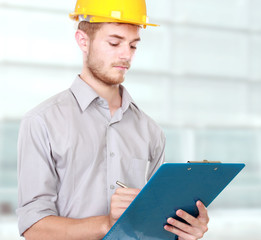 foreman on building site with hard hat