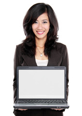 business woman showing blank laptop screen
