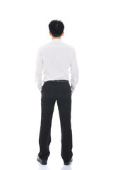  Asian business man from the back - looking at something over a