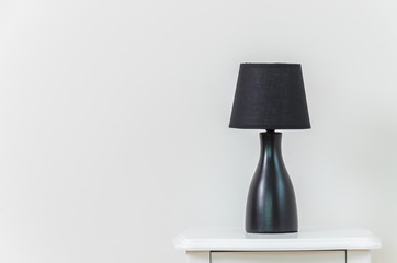 Lamp on bedside table
