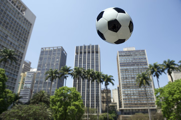 Football Flying in Sao Paulo Brazil City Skyline