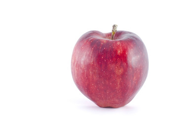 Fresh red apple on a white background