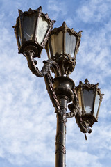 Fototapeta na wymiar Street Light against a Blue Sky