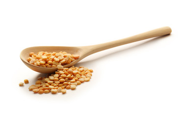 Peas in wooden spoon