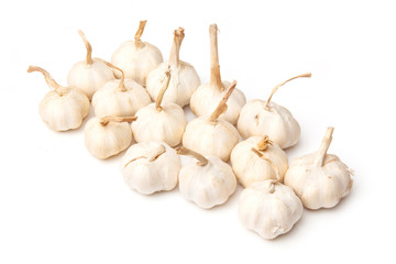 Garlic bulbs on a white background.