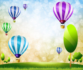 Naklejka premium Colorful balloons on Green meadow