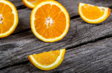 fresh and ripe orange fruits on a wooden table