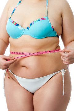 Body detail of overweight girl in bikini.