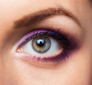 Closeup of womanish eye with glamorous makeup
