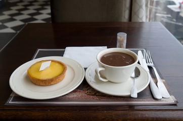 Lemon tart and hot chocolate