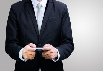Businessman standing posture hand hold phone isolated