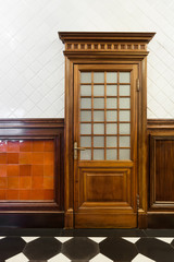 interior of a beautiful old building, detail of hardwood door