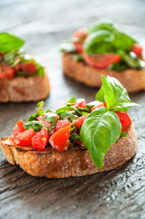 Italian tomato bruschetta with chopped vegetables