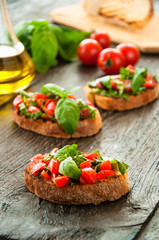Italian tomato bruschetta with chopped vegetables,
