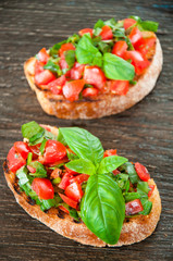 Italian tomato bruschetta with chopped vegetables