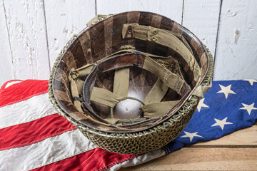 military helmet on an American Flag