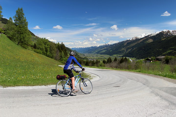Cyclist in Alps - 65186847