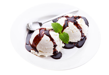 plate of vanilla ice cream with chocolat