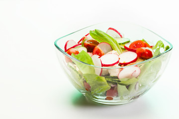 Fresh vegetable salad with cucumber and radish