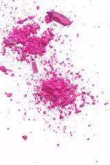 Pink makeup powder explosion suspension on white background