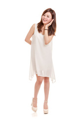 Malaysian woman in white dress giving listen gesture