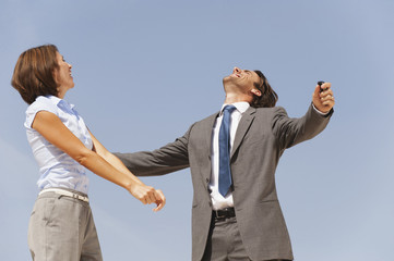 Business-Leute jubeln