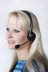 Portrait of young woman with headset