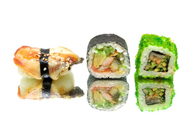 Japanese food - sushi and rolls on a white background
