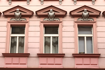 Three window of red building