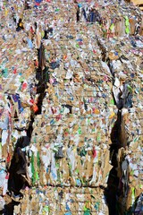 Compressed paper and cardboard for recycling