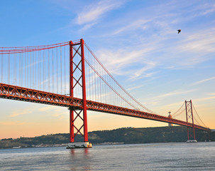Fototapeta na wymiar Lisbon bridge on sunset