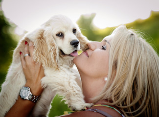 Woman playing with dog
