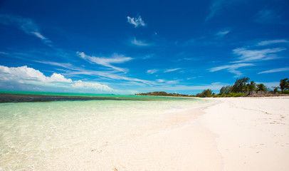 Perfect white beach with turquoise water at ideal island