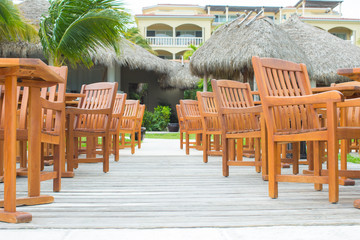 Fototapeta na wymiar Outdoor cafe on tropical beach at Caribbean