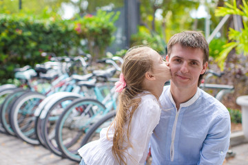 Fototapeta premium Little girl and young father on an exotic tropical resort
