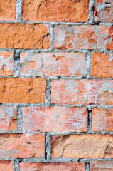 Red brick wall texture macro closeup, old detailed rough grunge