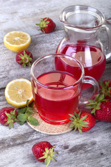 fresh and healthy homemade strawberry tea with lemon