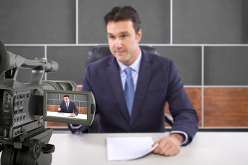tv studio camera recording male reporter or anchorman
