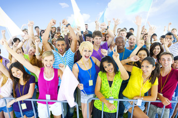Large group of young people cheering