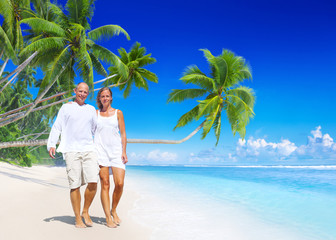 A couple walking on the beach