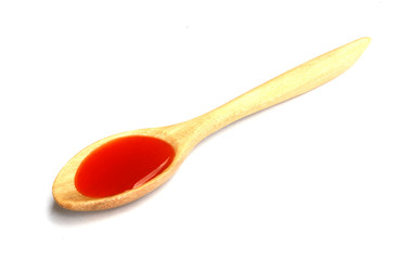 chili sauce in the spoons