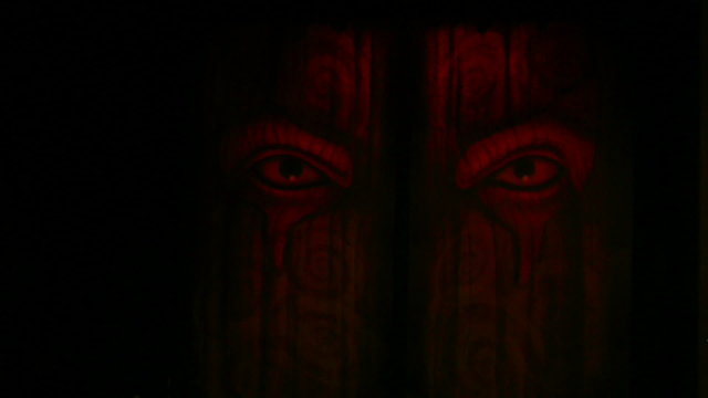 multicolor lighting on devil face door, full HD.