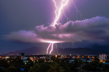 Lightning strike on the city mountain .
