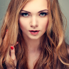 Fototapeta premium Beautiful girl, isolated on a light - grey, emotions, cosmetics