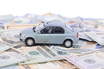 Car model on dollar bills