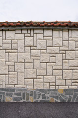 Fototapeta na wymiar Wall lined with stone slabs