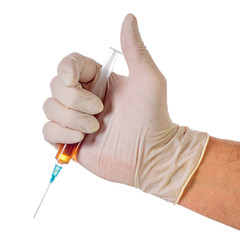 Syringe hold by hand in latex glove