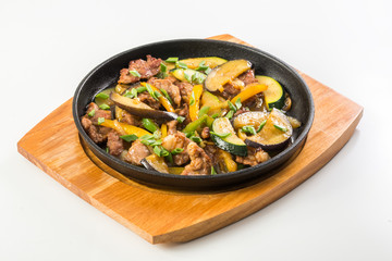 Meat and vegetables in the pan