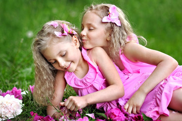 Portrait of two little girls twins