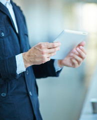 men holding digital tablet